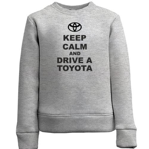 Детский свитшот Keep calm and drive a Toyota
