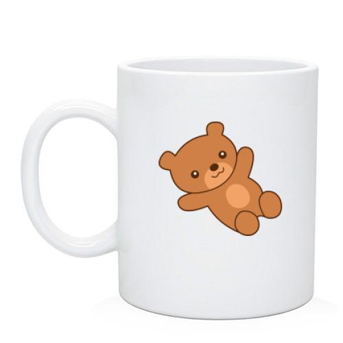 Чашка с  лежащим плюшевым медведем