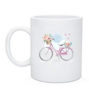 Чашка з рожевим велосипедом та квітами