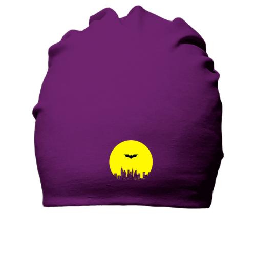 Бавовняна шапка з логотипом Бетмена на тлі міста