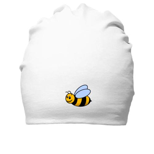 Бавовняна шапка в літаючою бджолою