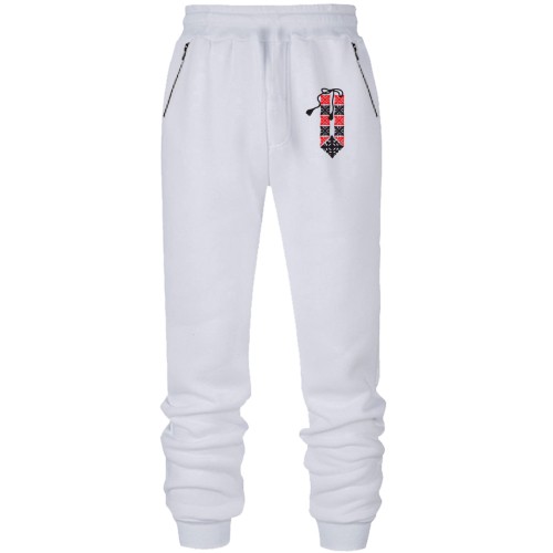 Штани з футера без начісу з малюнком у вигляді вишиванки із зав'язками