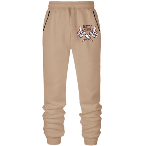 Чоловічі штани на флісі із зображенням схрещених тату-машинок та написом «TATTOO MASTER»