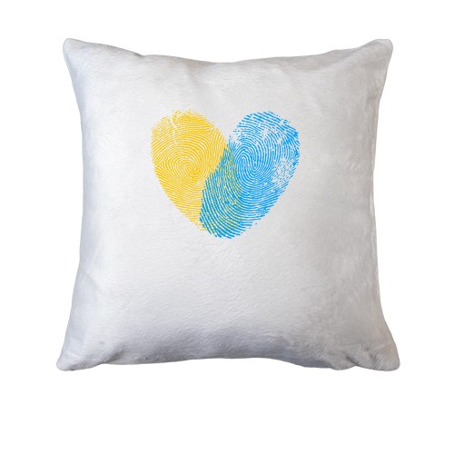 Подушка жовто-синіми відбитками у вигляді серця