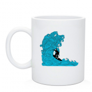 Чашка з серфінгістом на хвилі