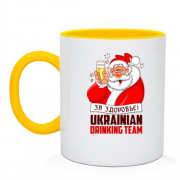 Чашка з надписью "Українська питна команда" та Дедом Морозом