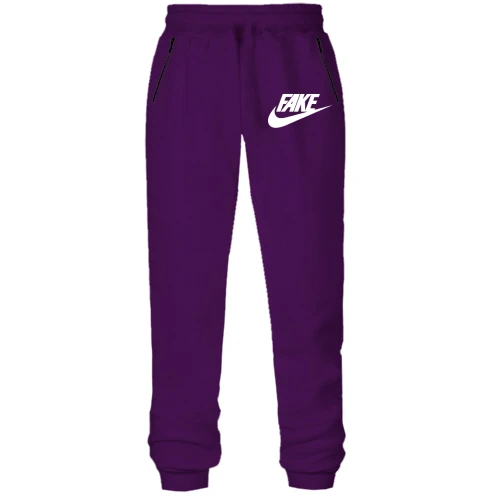 Жіночі штани на флісі з надписью "Fake" в стилі Nike