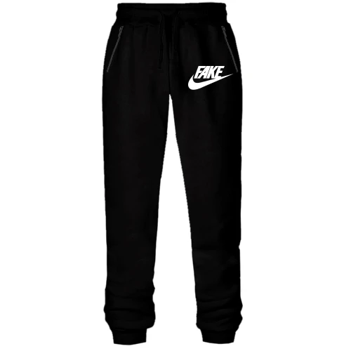 Жіночі трикотажні штани з надписью "Fake" в стилі Nike